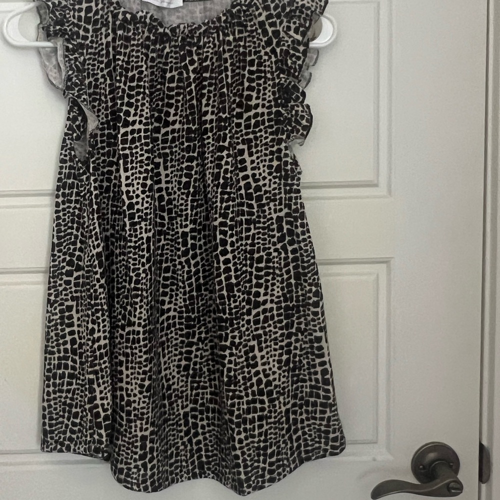 Stylish Black and White leopard  Womens ruffled sleeveless top